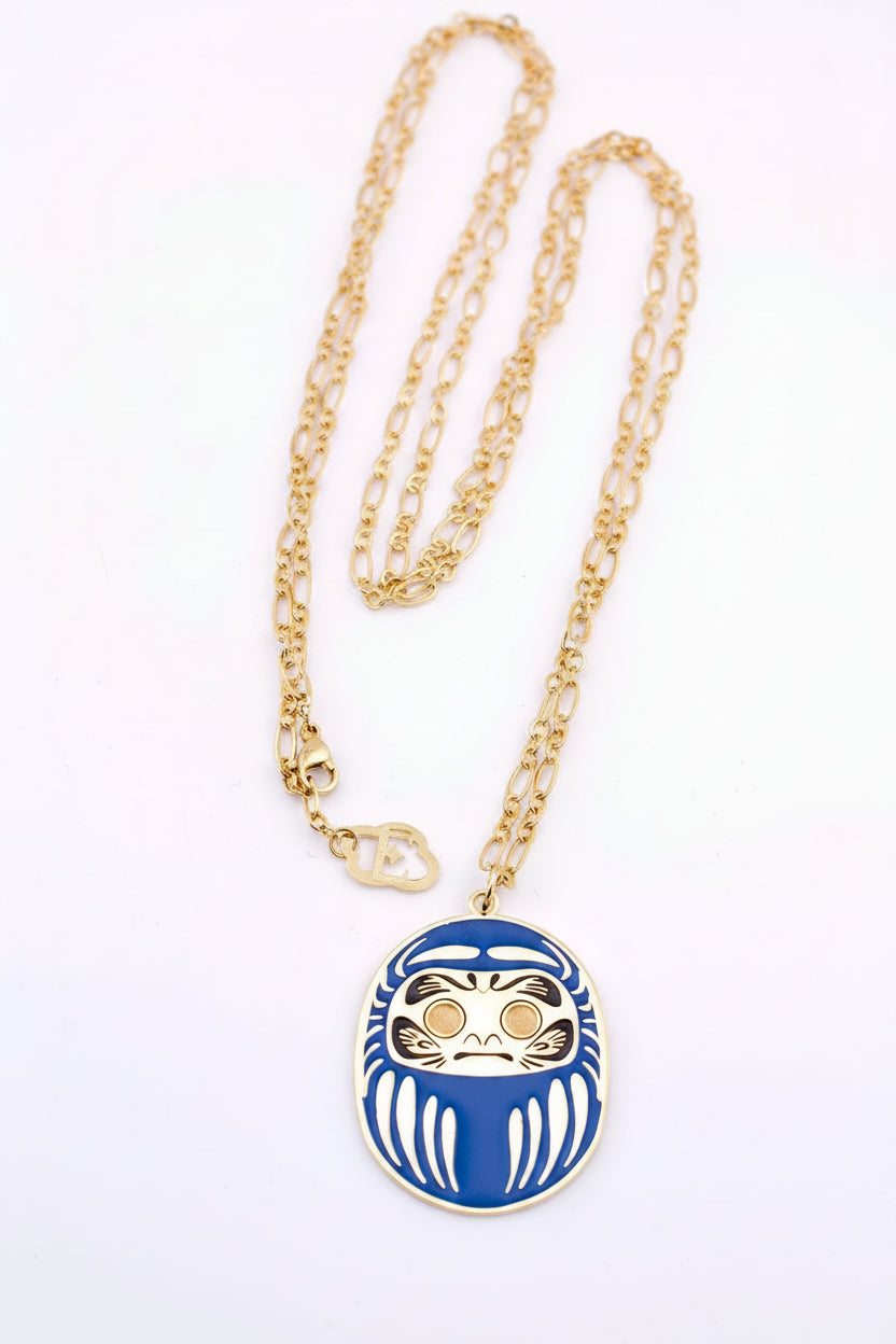 Collana con ciondolo Daruma blu simbolo di protezione per studio e lavoro