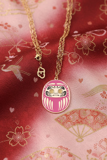 Collana Daruma Lunga rosa su tappeto Amore giapponese