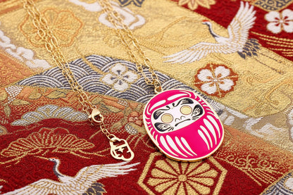 Collana Daruma Rosso portafortuna. Lunghezza 90 cm