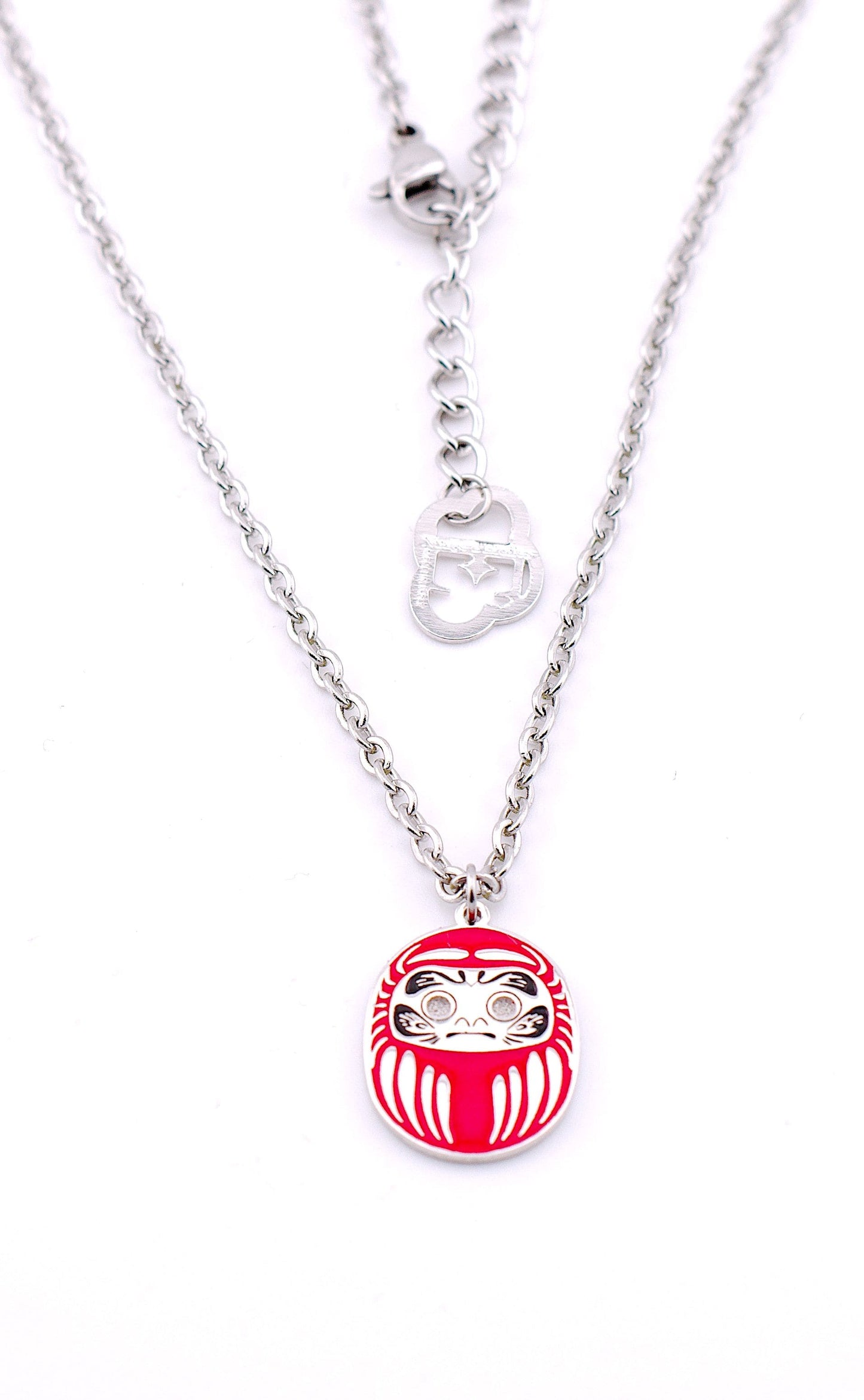 Collana Mini Daruma Rosso sfondo bianco – gioiello uomo artigianale Nuage d'Étoiles