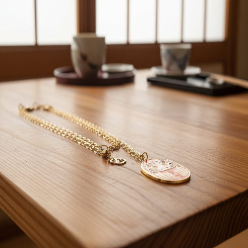 Collana Daruma Arancione con ciondolo oro 24K simbolo di famiglia creatività e nuovi inizi catena lunga 90 cm donna
